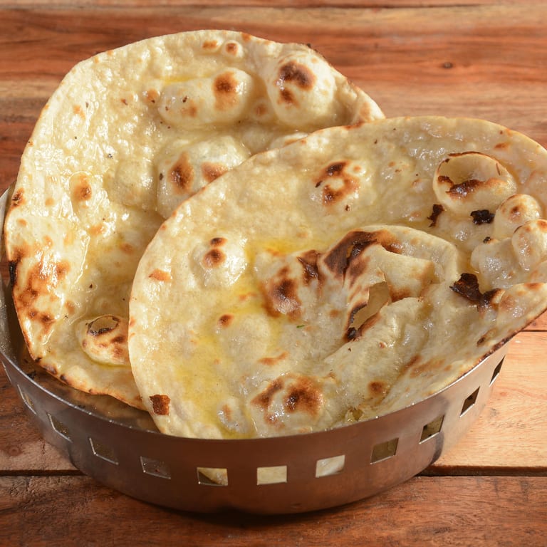 Fresh Naan Bread: A Must-Try at Our Indian Restaurant